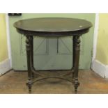 Late 19th century occasional table, the oval top raised on four turned and fluted supports united by