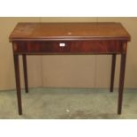 A Georgian mahogany fold over top tea table of rectangular form with inlaid detail, slender square