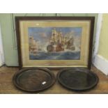 Two treen trencher/dishes in turned hardwood with moulded outline, 43 cm diameter, and a framed