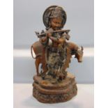 Large heavy good quality Indian bronze character group of a standing Buddhistic deighty playing a