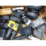 A box of mixed 35mm compact cameras, some range finder and view finder and SLR mixed to include