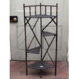 Late 19th century ebonised bamboo corner whatnot, four shelves on stylised frame, 110 cm high