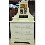 An Edwardian painted pine dressing chest with applied classical tied ribbon and swag detail and