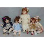 5 reproduction bisque head dolls with cloth bodies and ceramic lower limbs. Includes Jillian,