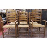A set of six (4&2) good quality ashwood ladderback chairs with rush seats on turned supports and