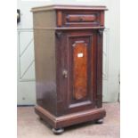19th century bedside/lamp cabinet enclosed by a panelled door and a frieze drawer with reeded detail