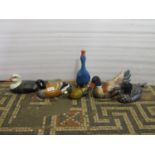 Six carved wooden model ducks with hand painted finish