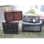 A vintage cabin trunk, two further vintage car trunks of varying size and design and a simple pine