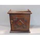 Good early Georgian table top spice box with split mould type panelled door enclosing seven short