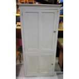 An old painted pine kitchen/housekeepers cupboard enclosed by two panelled doors with shelved