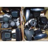 Two boxes of vintage cameras, mainly 35mm all with lenses and cases (2 boxes)