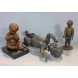 Cast lead study of a baby, 26 cm long, together with a further cast metal study of a seated