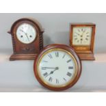 A 19th century boxwood inlaid fruitwood shelf clock together with a further early 20th century oak