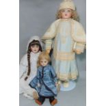 3 English reproduction bisque head dolls in period clothes including 2 tall dolls (75 and 80cm tall)