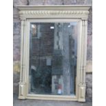 An antique wall mirror, probably French, with rectangular bevelled edge plate within a moulded frame