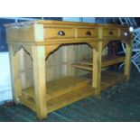 A substantial vintage style beechwood kitchen work table/dresser fitted with four frieze drawers