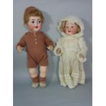 2 early 20th century German bisque head dolls with 5 piece composition bodies including Kammer &