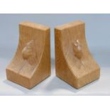 Robert Mousemann Thompson - pair of carved oak book ends, 15 cm high (2)