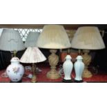 Pair of carved wooden lobed baluster table lamps, with six others (8)