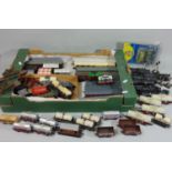 Mixed collection of model rail wagons, coaches and tankers, mostly 00 gauge together with 12