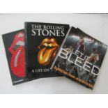 A collection of books and records about and by The Rolling Stones to include The Rolling Stones