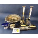 Two boxes containing a large collection of silver plated wares comprising platters, candlesticks,