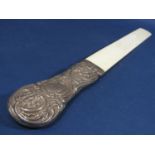Early 20th century Victorian style silver handled ivory page turner, the baluster handle embossed