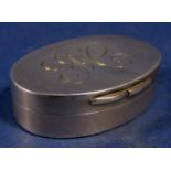 Edwardian silver oval viniagrette, the hinged lid enclosing a pierced floral grill, maker RC,