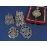 Collection of four silver badges and medals together with a further silver chain (5)