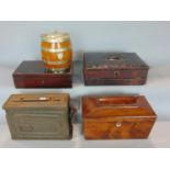 A Victorian mahogany sarcophagus shaped tea caddy, an oak and silver plated biscuit barrel, a