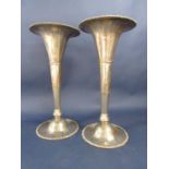 A pair of silver plated flared faceted vases upon stepped circular gadrooned bases, 39cm high (2)