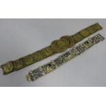 An unusual arts and crafts type enamel panelled bracelet decorated with various classical