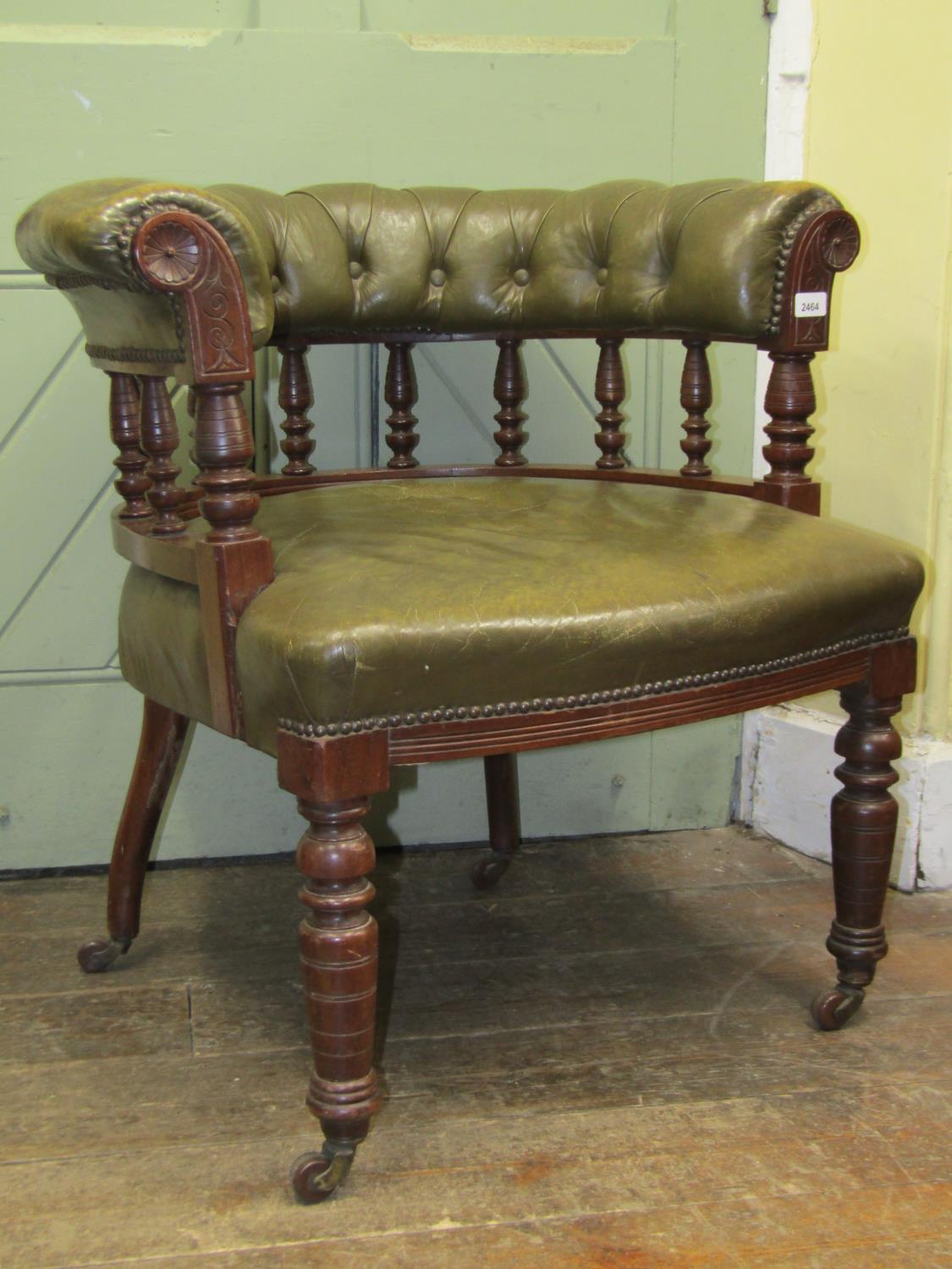 A Victorian mahogany library of office chair, the show wood frame with turned spindle mouldings