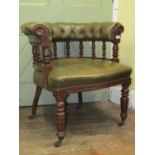 A Victorian mahogany library of office chair, the show wood frame with turned spindle mouldings