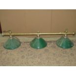 A vintage style hanging snooker table light, chain hung, with tubular brass effect bar supporting