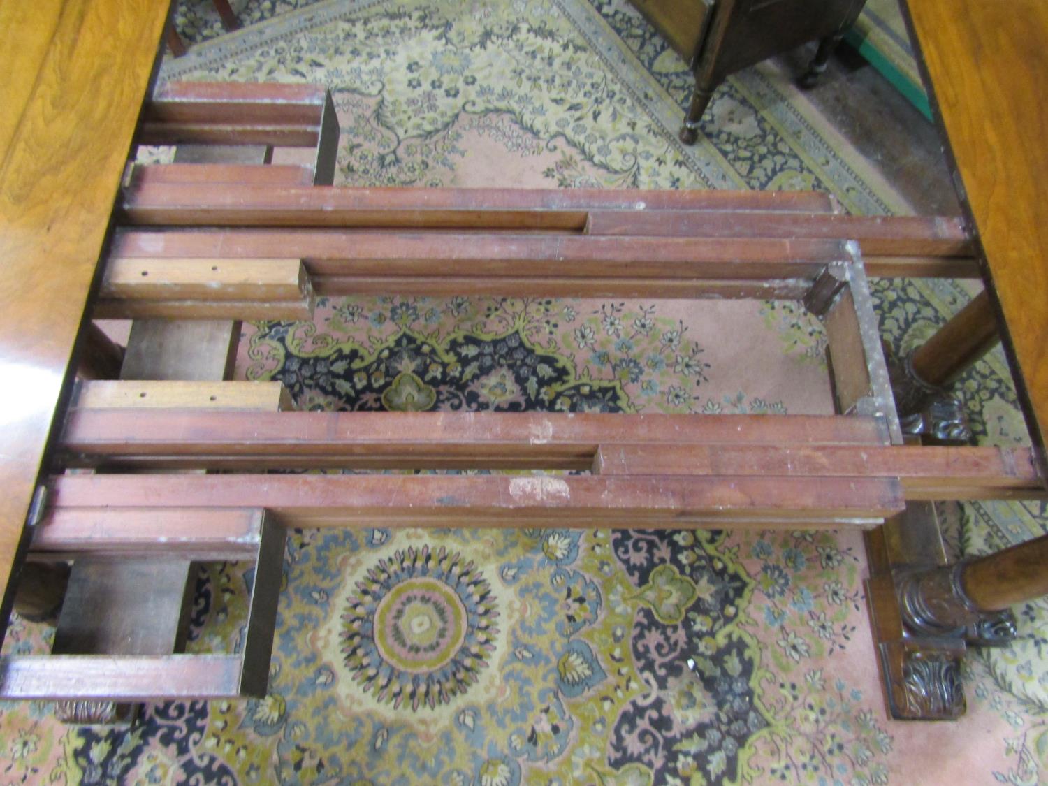 A good quality late Victorian/early Edwardian walnut D end extending dining table, raised on three - Image 7 of 9