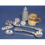 A mixed collection of silver comprising four brooches, three spoons, a silver lidded salt and a