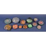 A collection of 13 Millefiori paperweights