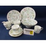 A collection of Minton Vanessa pattern wares comprising milk jug, sugar bowl, two tier cake stand (