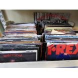 A box containing an extensive collection of 45rpm vinyl records, mostly heavy metal, rock, etc,