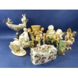 A collection of decorative ceramics on a cherub theme including a Copeland white glazed wall