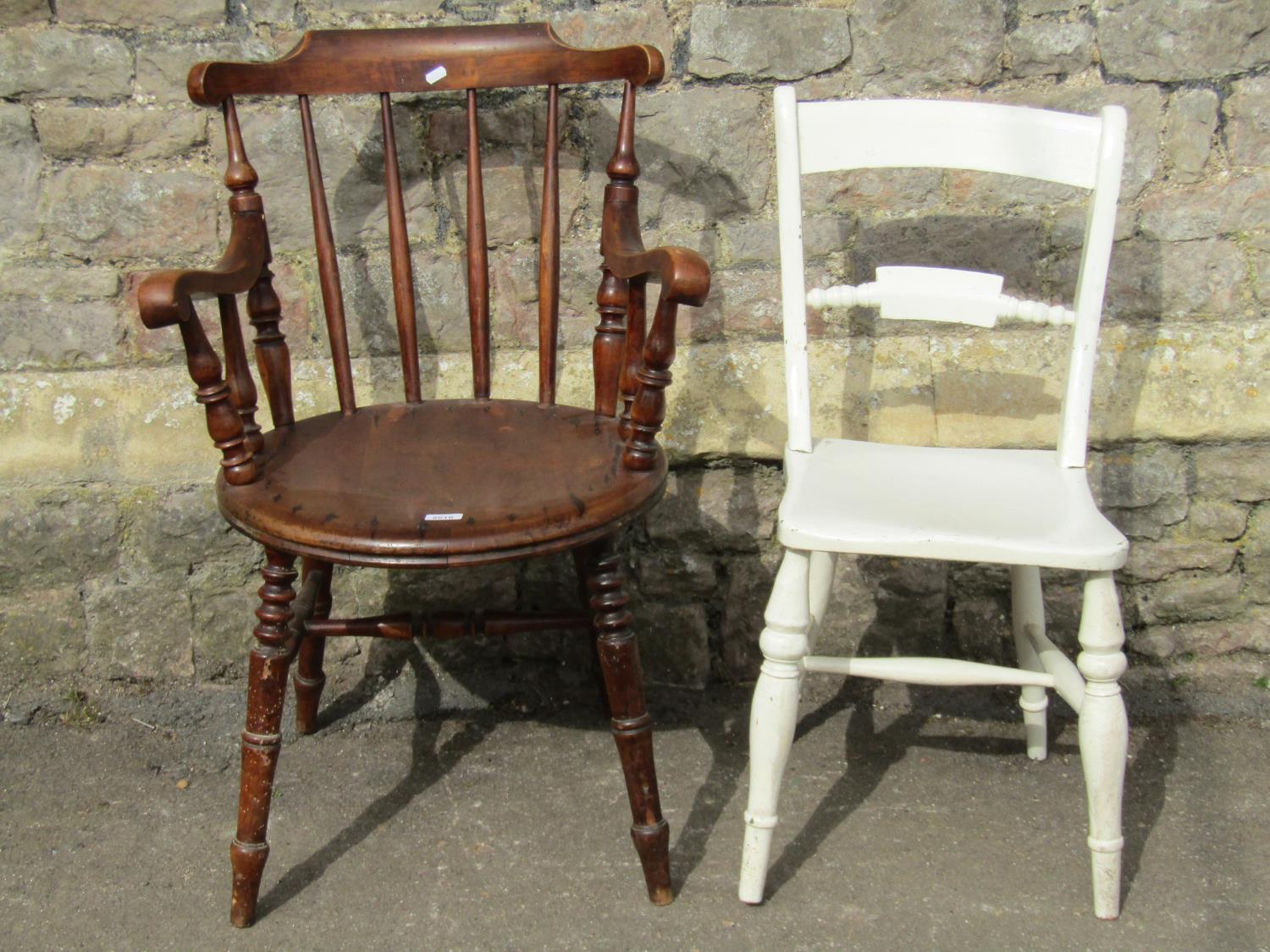 A Swedish stained beechwood stick back elbow chair with circular seat, raised on turned supports ( - Image 3 of 3