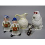 A Beswick model of a white poodle with red bow, a Beswick model of cat playing a fiddle, a Belleek