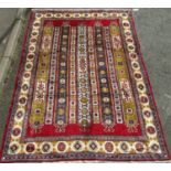 Unusual Azerbaijan full pile carpet with bespoke medallion design, red ground, 280 x 200 cm
