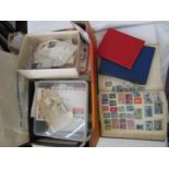 A box containing three stamp albums and stock books, unsorted loose stamps, some mint, further loose