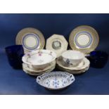 A set of six 19th century continental dessert plates, possibly Vienna, with pierced borders and blue