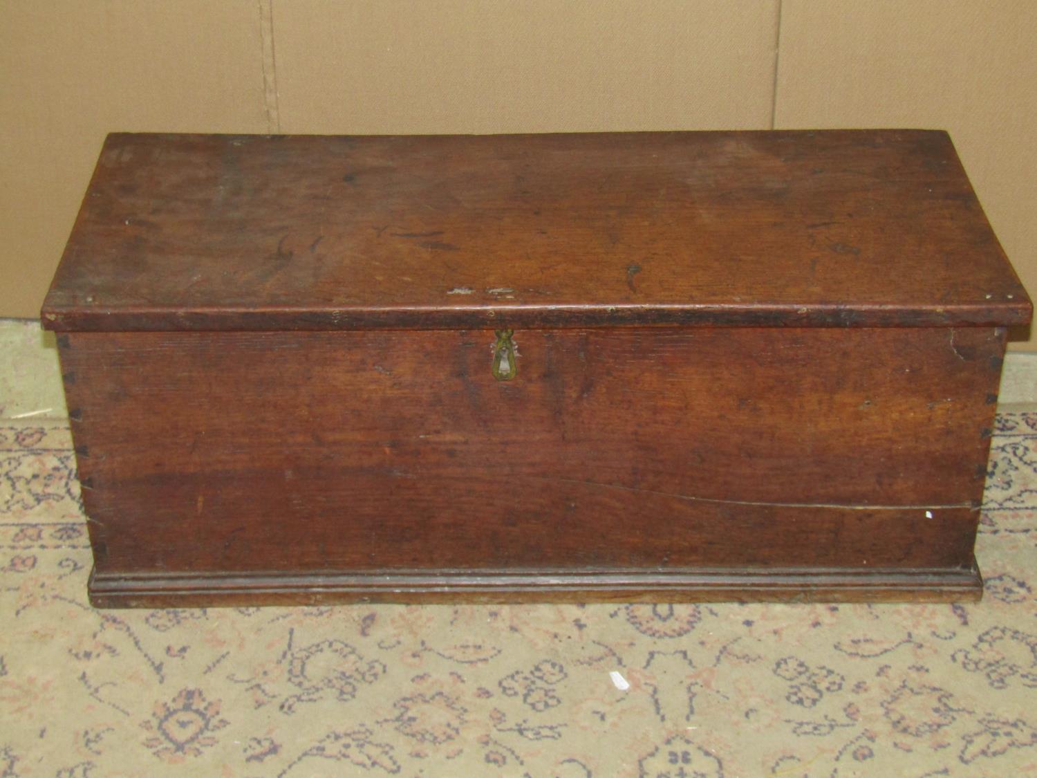 A 19th century oak and elm box with hinged lid, dovetail construction and drop side carrying