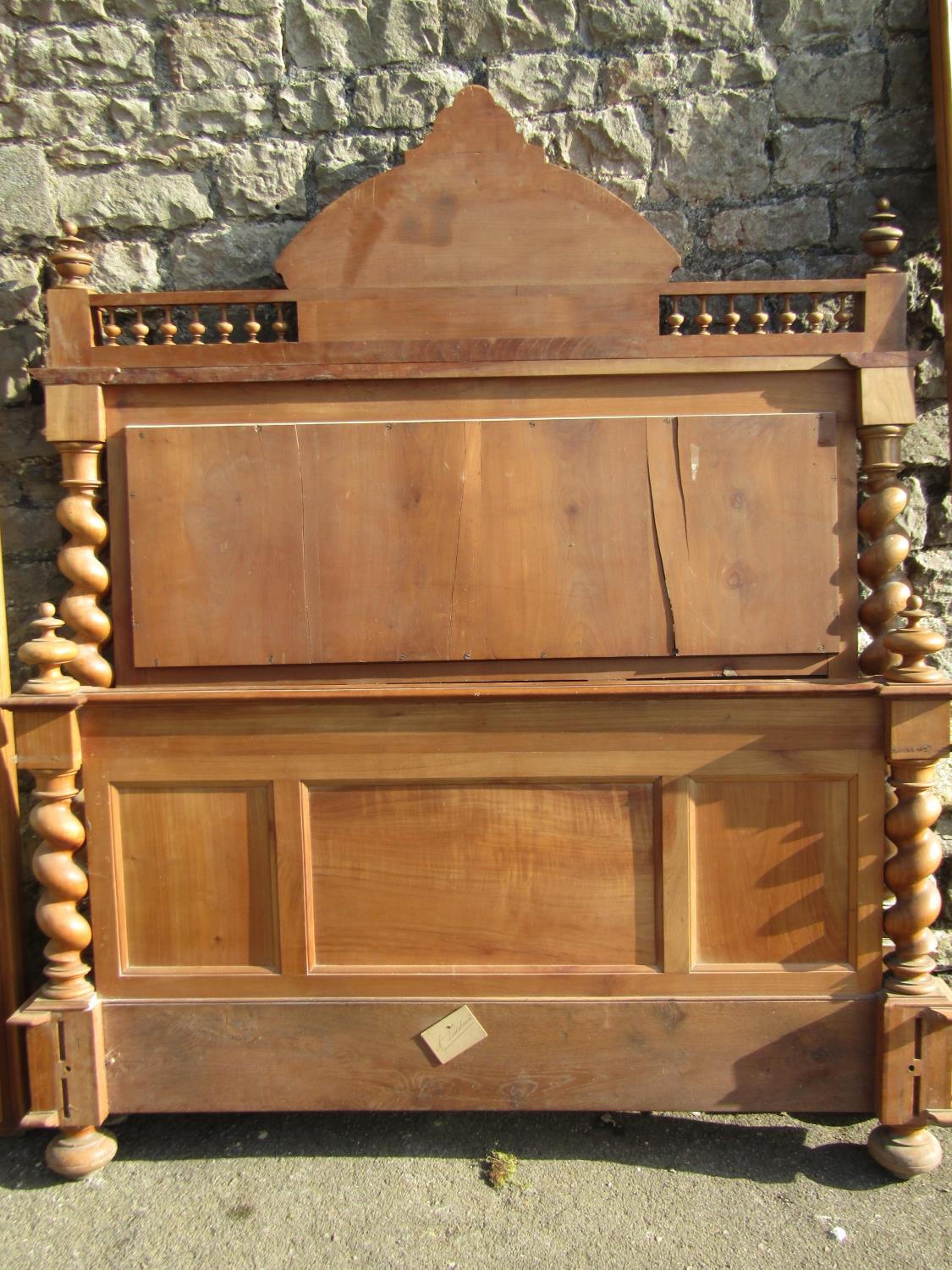 A 19th century continental bedstead in mixed woods, mainly fruitwood and chestnut, the headboard - Image 3 of 3