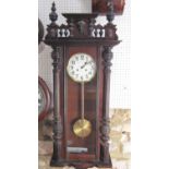 Vienna style regulator wall clock, with mahogany and ebonised case, twin train enamel dial, with