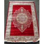 Unusual woven bamboo silk full pile Kashmir rug with central floral medallion decoration and ivory